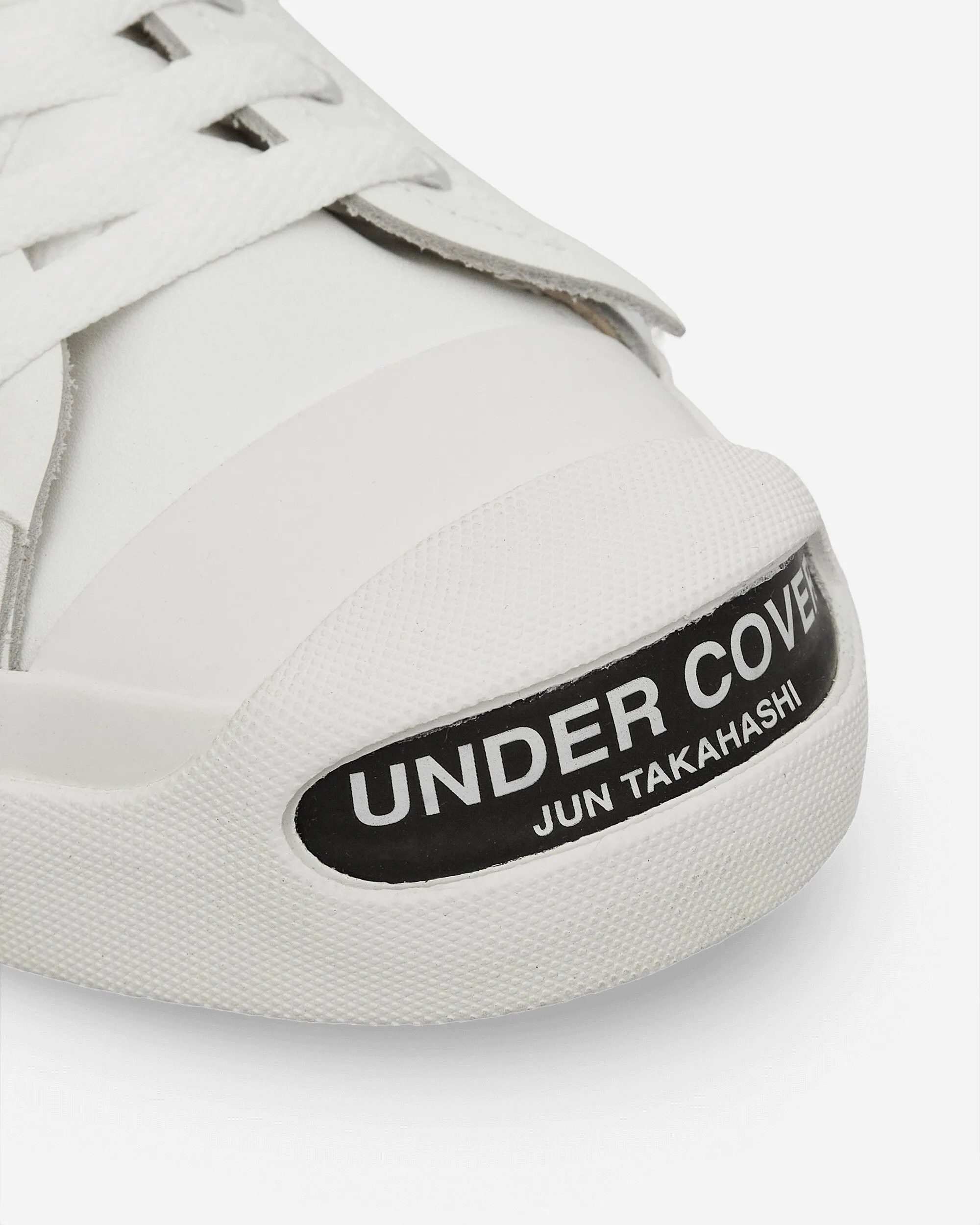 Baskets en cuir blanc avec logo sur l'orteil pour hommes
